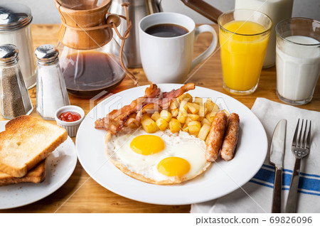 traditional american breakfast on wooden table 69826096