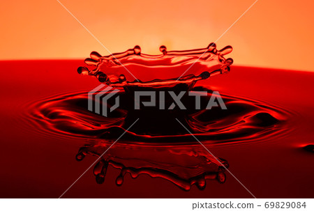 Colorful water splash 69829084