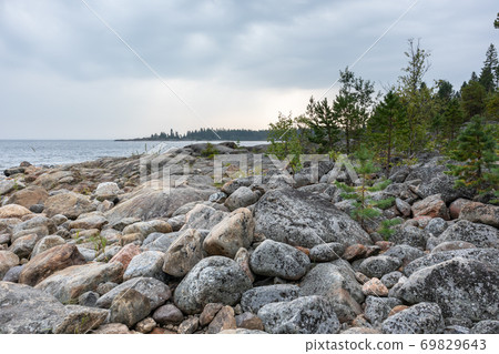 Sweden rocky sea side. Northern cloudy landscape Sweden rocky sea side. Northern cloudy landscape 69829643