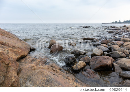 Sweden rocky sea side. Northern cloudy landscape Sweden rocky sea side. Northern cloudy landscape 69829644