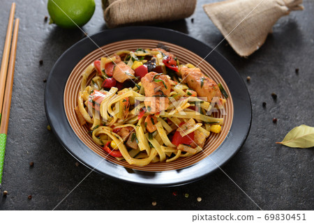 Noodles with chicken and vegetabels 69830451