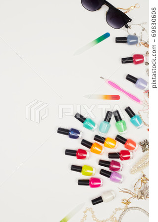 concept, manicure with nail polish, pedicure on white background, copy space, Flat Lay 69830608
