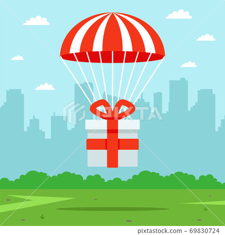 a gift falls from the sky by parachute.  69830724