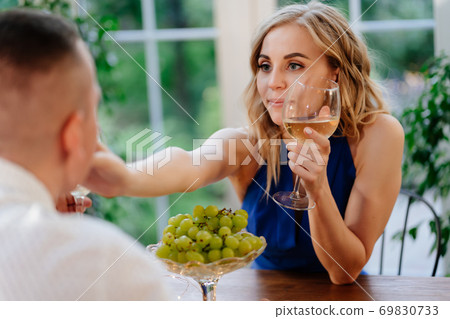 girl. romantic dinner for couple.lovers drink wine girl. romantic dinner for couple.lovers drink wine 69830733