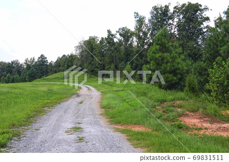 Beautiful rural landscape and dirt road 69831511