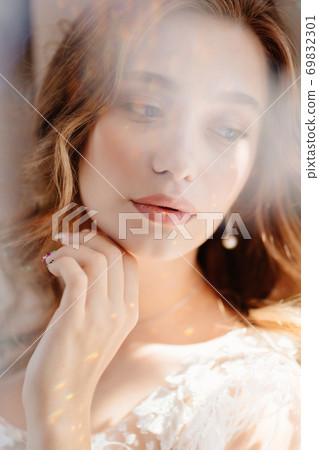 close-up sun glare. beautiful woman with long hair 69832301