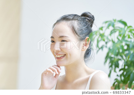 A woman with a smile A woman with a smile 69833347