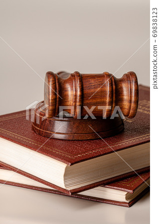 Judge gavel and legal book close up on table 69838123