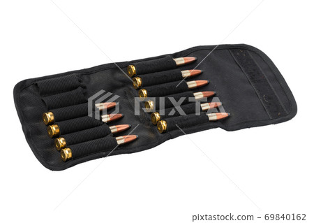 Black case for brass cartridges isolated on white Black case for brass cartridges isolated on white 69840162