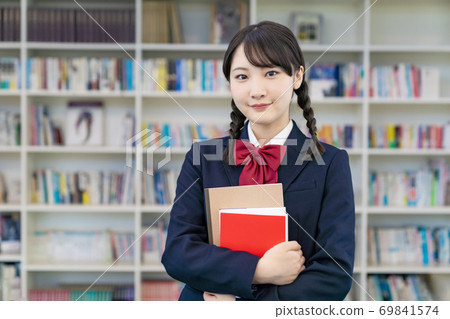 High school girl in the library 69841574
