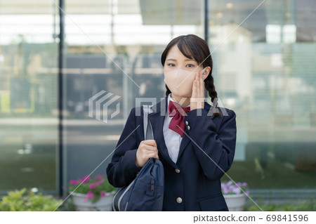 High school girl wearing a mask 69841596