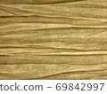 Pale yellow opaque mid sharp/mid blurry rough paper background with horizontal lines lit from behind 69842997