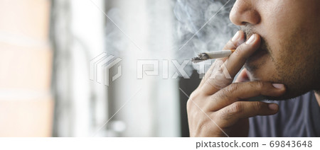 World No Tobacco Day, Man Smoking 69843648