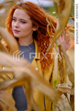 Autumn portrait of a beautiful woman 69845405