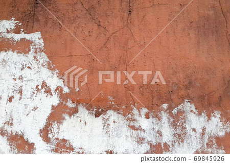 Old plaster texture. Cracked white red brown concrete wall. 69845926
