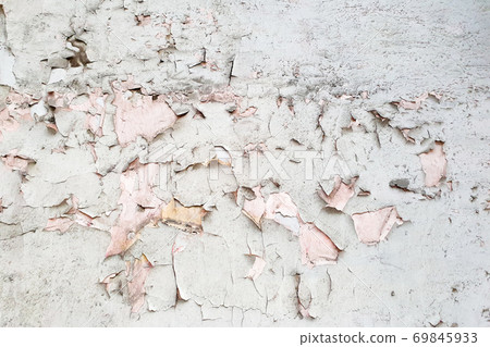 Old peeling plaster texture. Light faded gray-pink cement wall. Damaged wall texture. 69845933