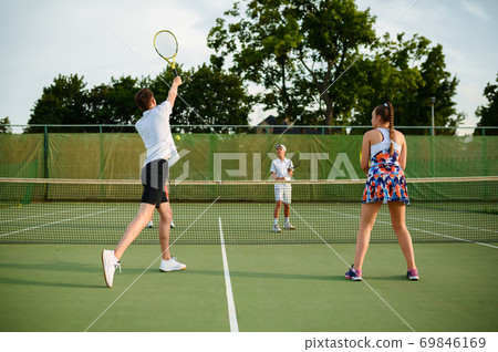 Mixed doubles tennis players, outdoor court 69846169