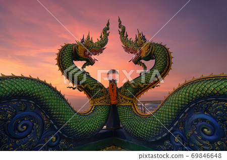Head of Naga snake in Wat Khao Phra Kru Temple, Si Racha District, Chonburi, Thailand. Landmark tourist attraction. Thai architecture. 69846648
