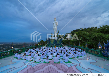 Cycle of human life breaths and slow heart beat with relax praying meditation in Wat Khao Phra Kru Temple, Si Racha District, Chonburi, Thailand. Circle of people. 69846652