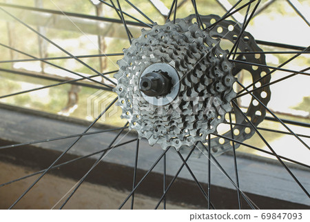 old of Bicycle a gears take off for maintenance. old of Bicycle a gears take off for maintenance. 69847093