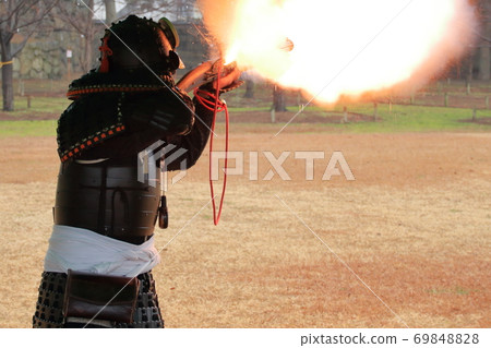 The gun corps shoots with a matchlock gun The gun corps shoots with a matchlock gun 69848828