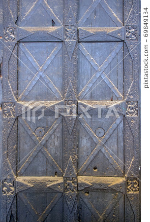The Wooden door with carvings of the musician, 1089 A.D.. Buddhist temple The Shwezigon pagoda. The Wooden door with carvings of the musician, 1089 A.D.. Buddhist temple The Shwezigon pagoda. 69849134