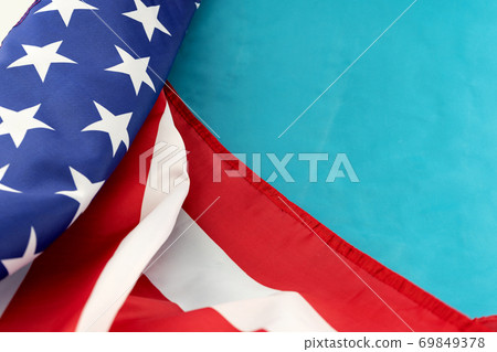Usa or american flag on blue background with copy space. 69849378
