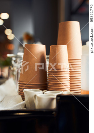 Focused paper cups stack in cafe Focused paper cups stack in cafe 69851776