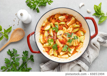 Sauteed Vegetables. Zucchini, carrot, onion, garlic and tomatoes Sauteed Vegetables. Zucchini, carrot, onion, garlic and tomatoes 69851994