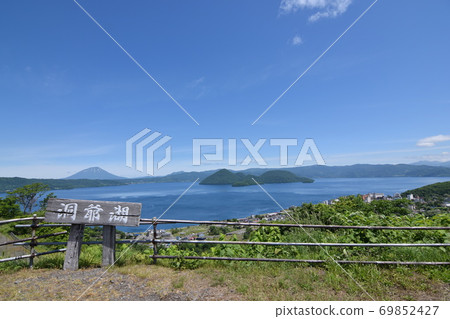 Lake Toya on a clear day overlooking Mt. Yotei, Hokkaido Lake Toya on a clear day overlooking Mt. Yotei, Hokkaido 69852427