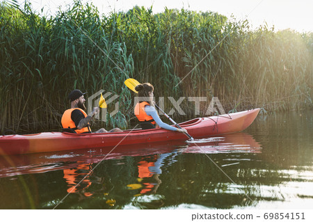 Group of young people on kayak Group of young people on kayak 69854151