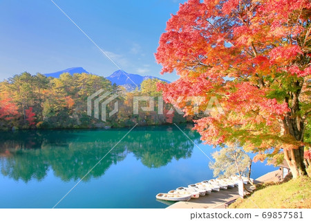 Autumn leaves of Bishamon-numa and Mt. Bandai 69857581