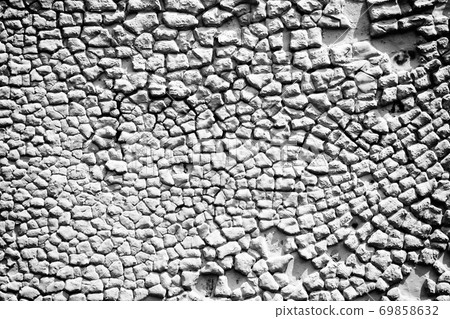 Surface of the old metal wall is covered with a lot of cracks. Destruction of the old cracked paint. 69858632