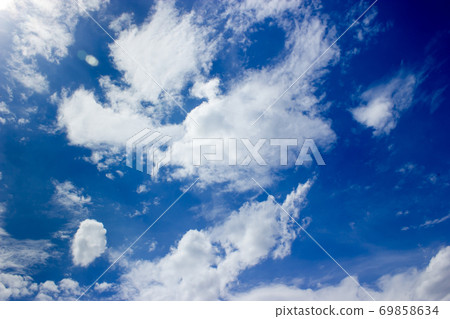 Blue sky and beautiful fluffy cloud. Best summer sky photo background Blue sky and beautiful fluffy cloud. Best summer sky photo background 69858634