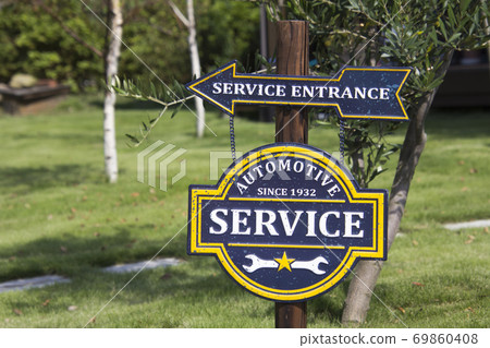 Tin sign on the lawn Tin sign on the lawn 69860408