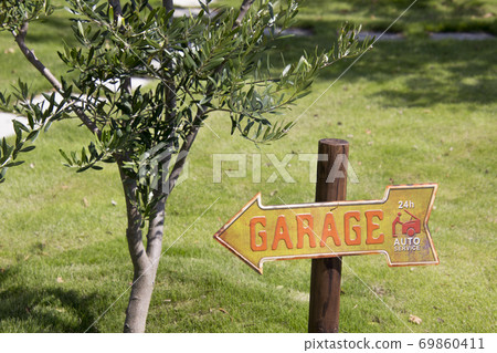 Tin sign on the lawn Tin sign on the lawn 69860411