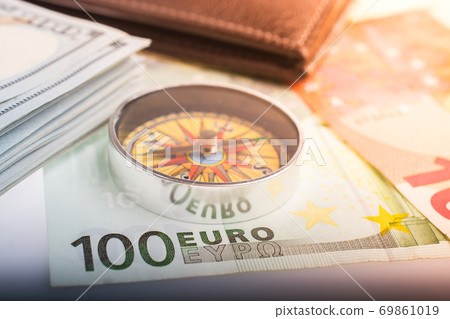 Compass, box, wallet and Euro banknotes as business finance concept Compass, box, wallet and Euro banknotes as business finance concept 69861019