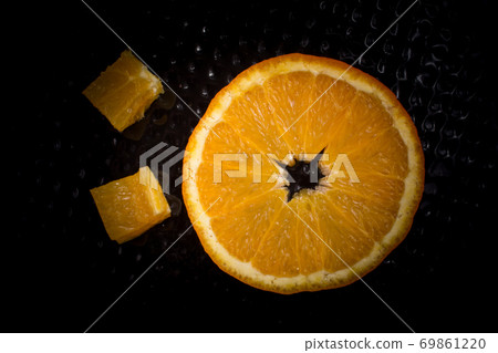 A view of a juicy ripe cut orange fruit A view of a juicy ripe cut orange fruit 69861220