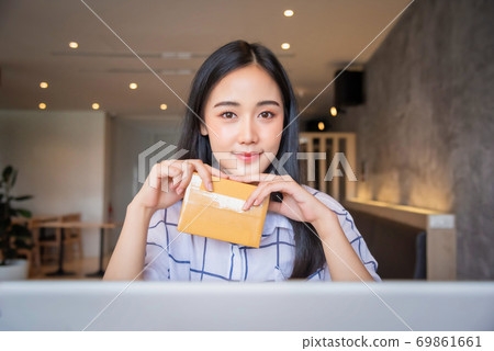 Portrait of Young asian working online shopping Portrait of Young asian working online shopping 69861661