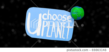 Plasticine Earth planet handmade and sticker with ecology text on black background with white stars bokeh. Ecology Concept for Earth Hour, Earth Day, Ocean Day and other ECO dates. Plasticine Earth planet handmade and sticker with ecology text on black background with white stars bokeh. Ecology Concept for Earth Hour, Earth Day, Ocean Day and other ECO dates. 69863148