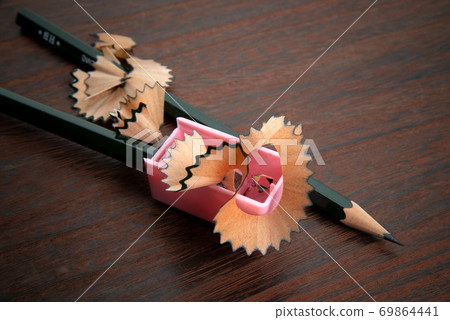 Pencil sharpened with a pencil sharpener Pencil sharpened with a pencil sharpener 69864441