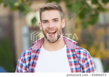 Add smiling moment to your life. Happy guy smile outdoors Add smiling moment to your life. Happy guy smile outdoors 69866655