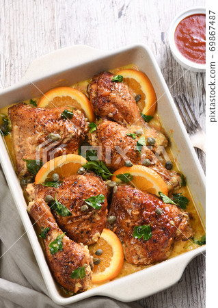 Fried chicken with oranges Fried chicken with oranges 69867487