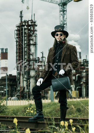 Young man weared in steampunk style 69868929