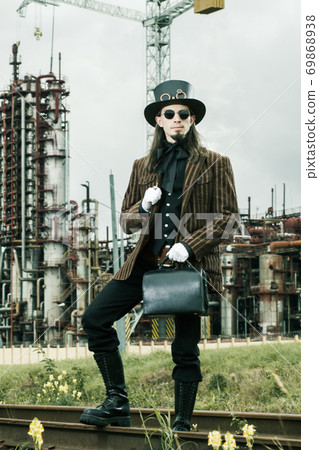 Young man weared in steampunk style 69868938