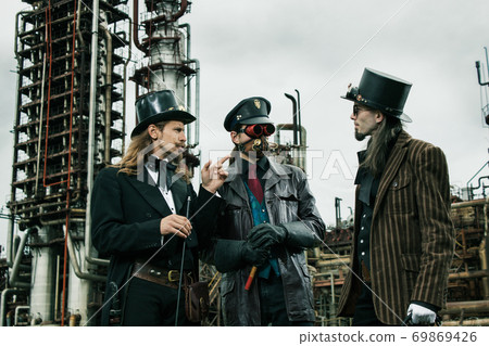 Three mans in steampunk style 69869426