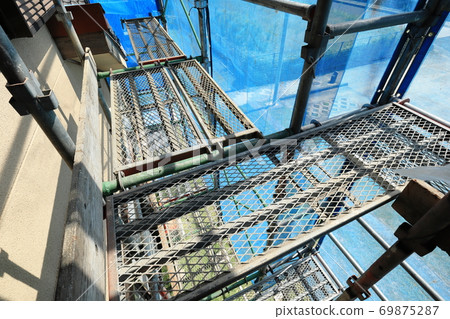 Scaffolding for construction sites seen from indoors 69875287