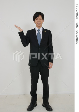 A young refreshing lawyer in a suit 69875347