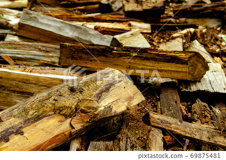 Abstractb background old aged dry fire wood timber planks pile chopped. Heating home concept. Abstractb background old aged dry fire wood timber planks pile chopped. Heating home concept. 69875481