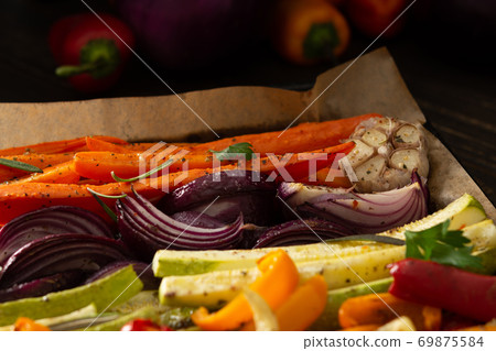 Stewed vegetables on a baking sheet Stewed vegetables on a baking sheet 69875584